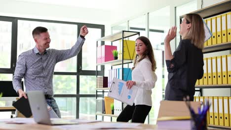 colleagues engaged in a playful office dispute