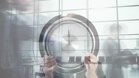 animation of businessman holding clock, time-lapse of people walking against glass window in office