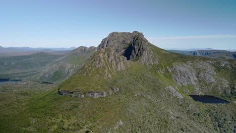 forward drone view of cliff of hills during afternoon