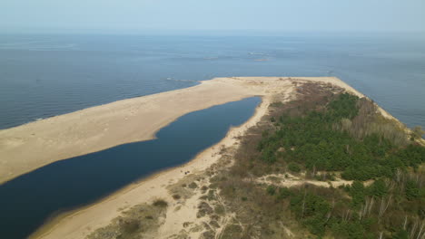 Revealing-pull-out-aerial-view-over-the-Nature-reserve-of-Mewia-Lacha-Poland