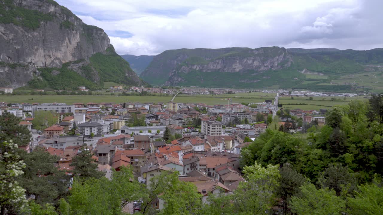 The villages of Mezzolombardo in the foreground and Mezzocorona in the background in Trentino, Italy surrounded by the Italian Alps