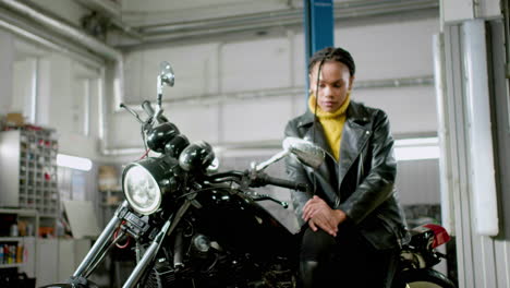 woman sitting on her motorbike