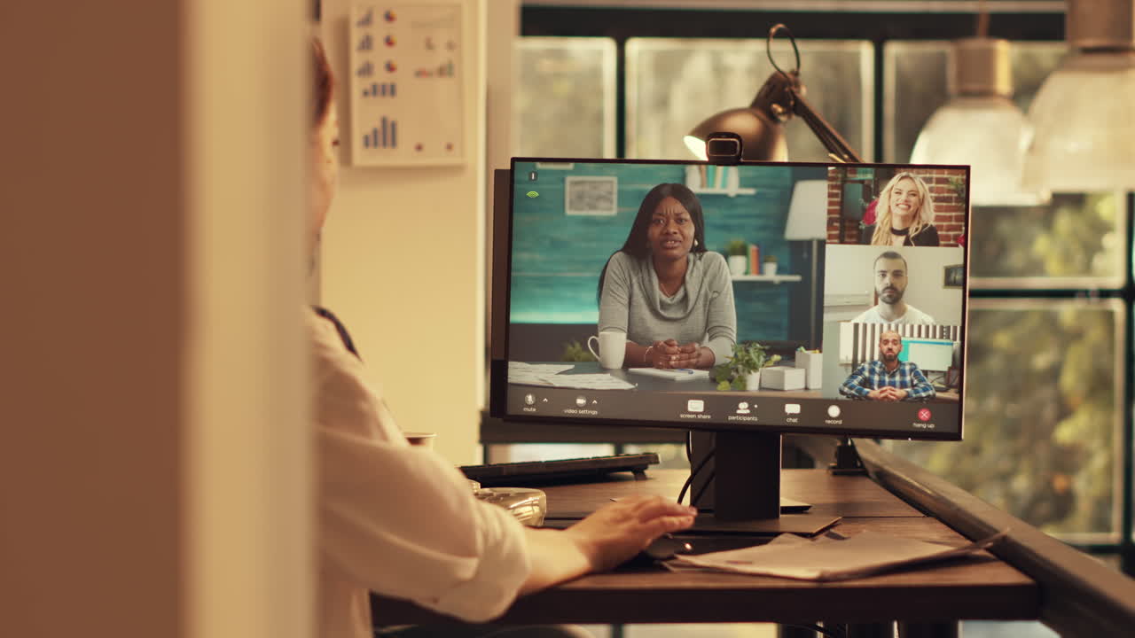 Corporate employee talking to people on online videocall conference