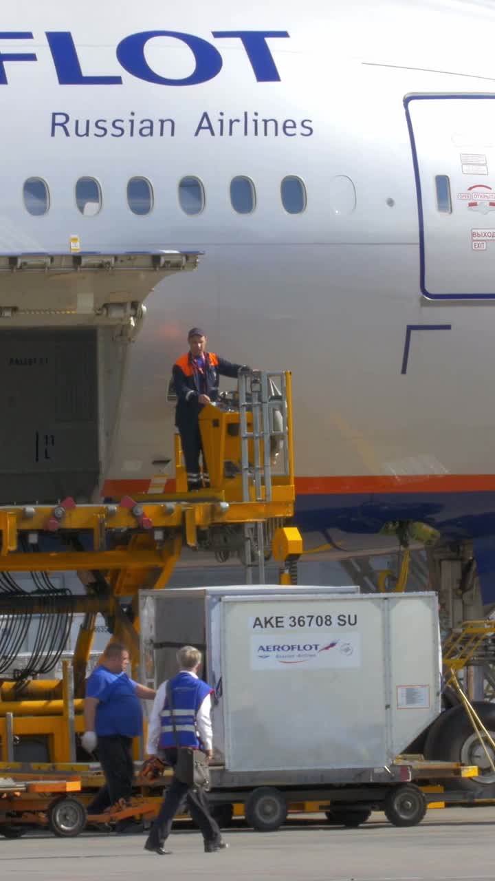 Aeroflot Airplane Being Loaded with Luggage at Airport