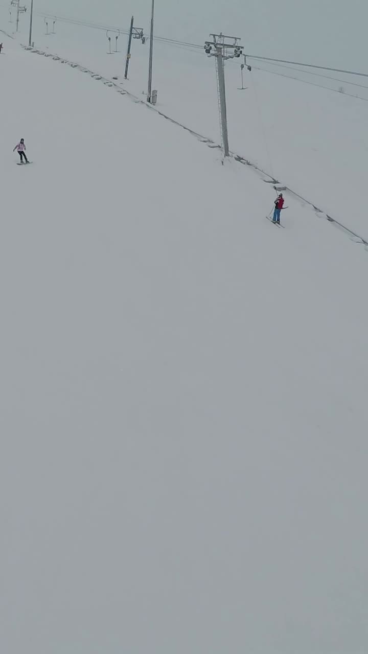 Skiing on a Snowy Slope