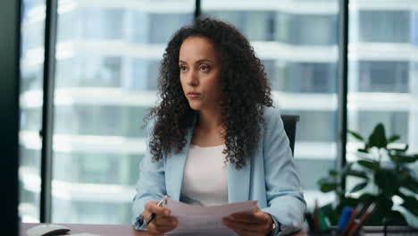 woman using video chat communicating with colleagues close up. girl working.