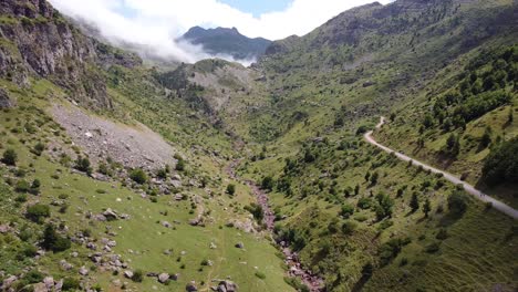 spanish pyrenees, spain - aerial drone view of the hiking trail in valle de aguas tuertas valley