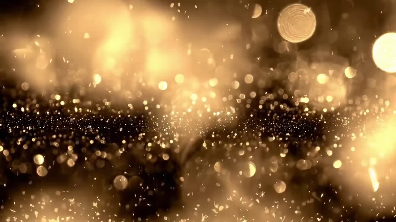Effetto bokeh in un video con un angolo ravvicinato, con sfere di luce dorata calda