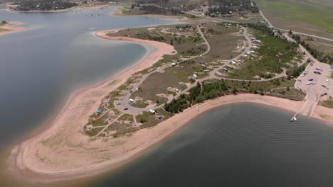 Aerial-rotates-over-Stillwater-Campground-on-Lake-Granby,-Colorado