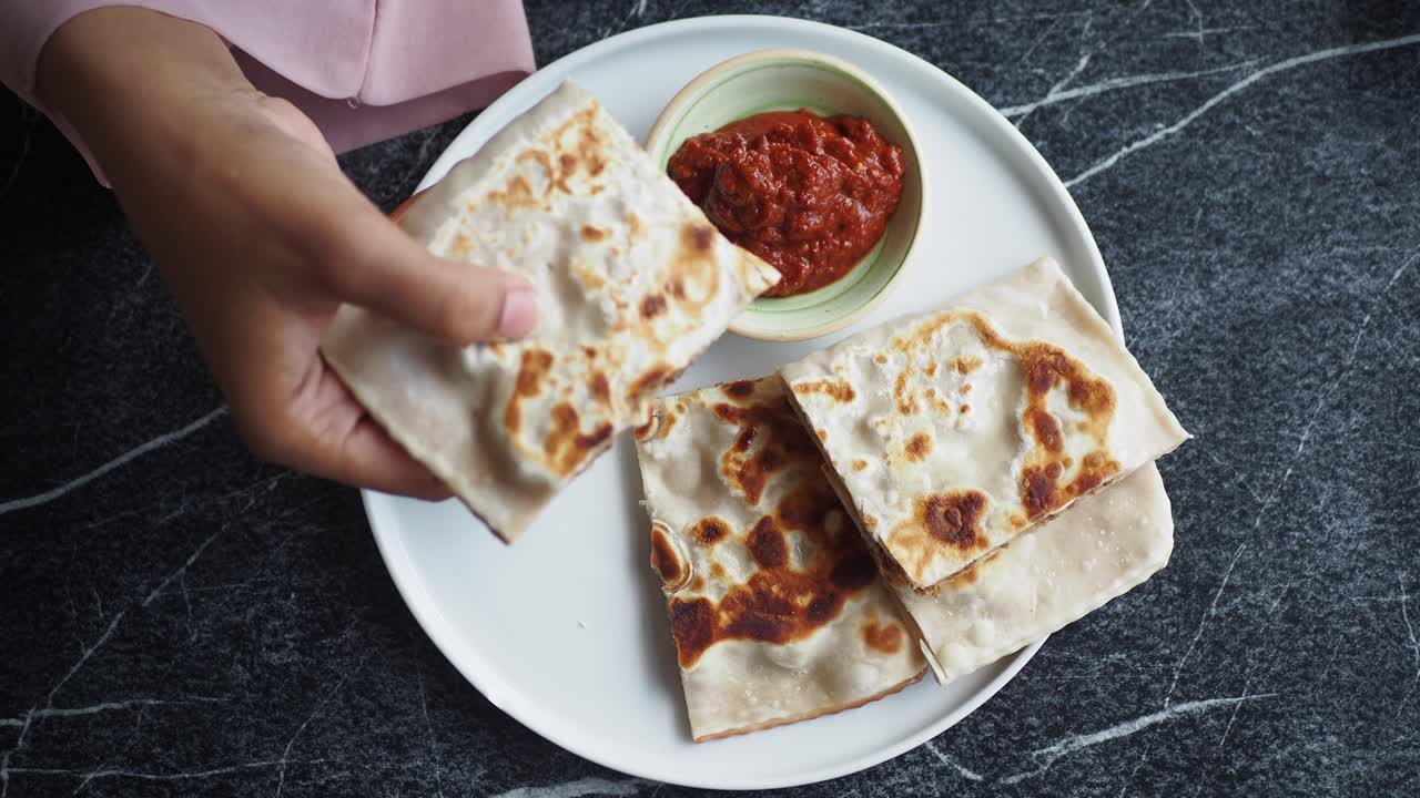Delicious Turkish Flatbread with Yogurt and Red Sauce