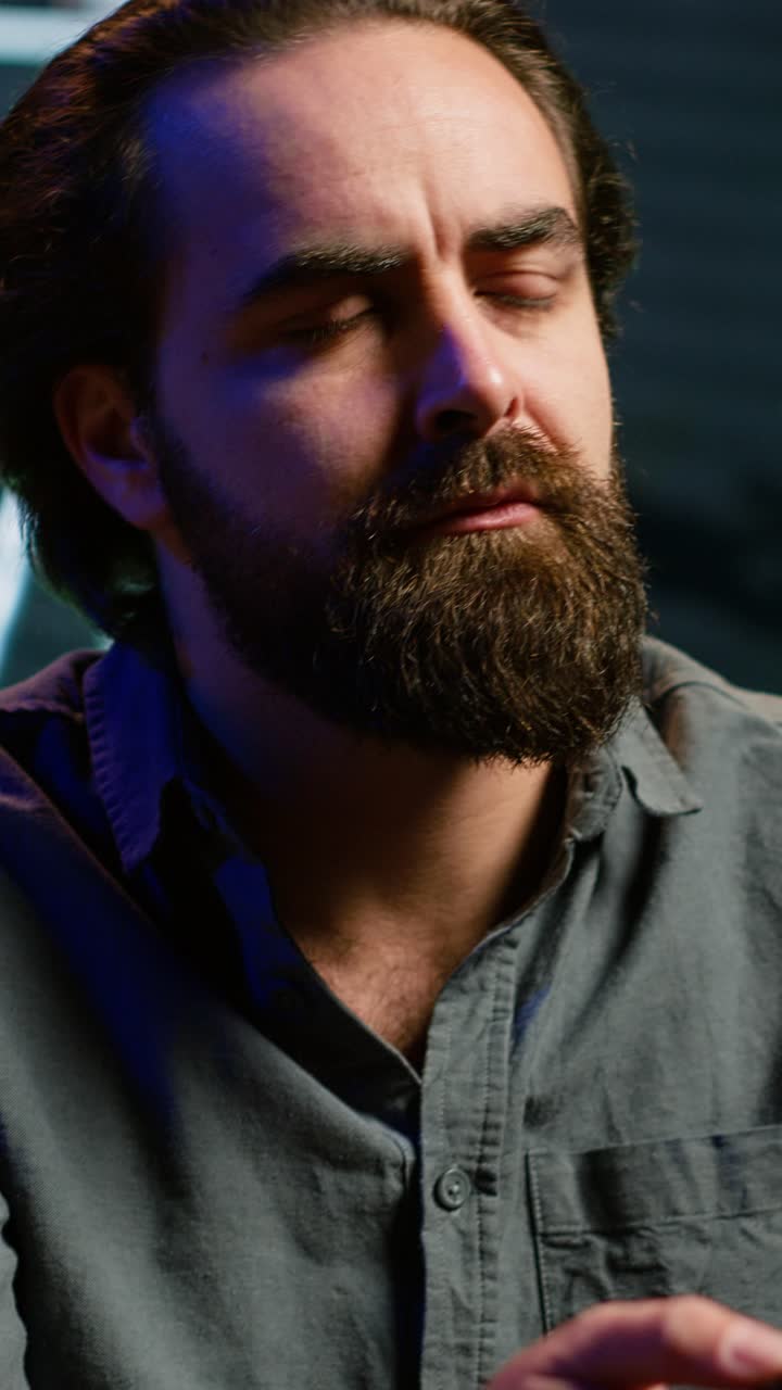 Vertical video Perplexed man watching unconvincing team performance sports match on TV