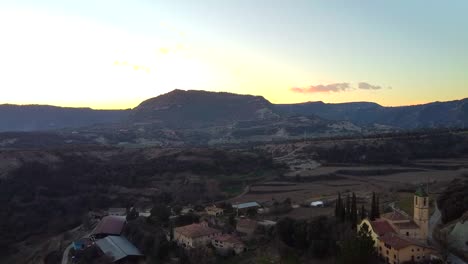 Aerial-view-rural-and-remote-village-in-mountains-of-Catalonia,-Spain