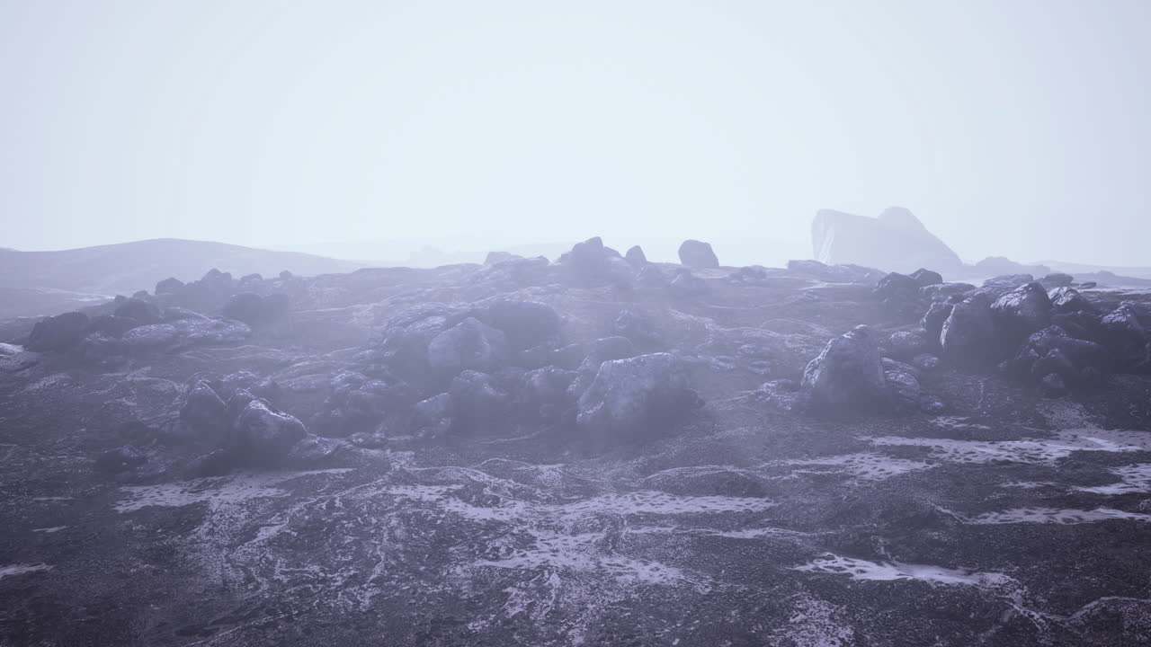 Unique rocky landscape under a misty atmosphere in a distant location