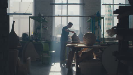 sculptor at work in a studio