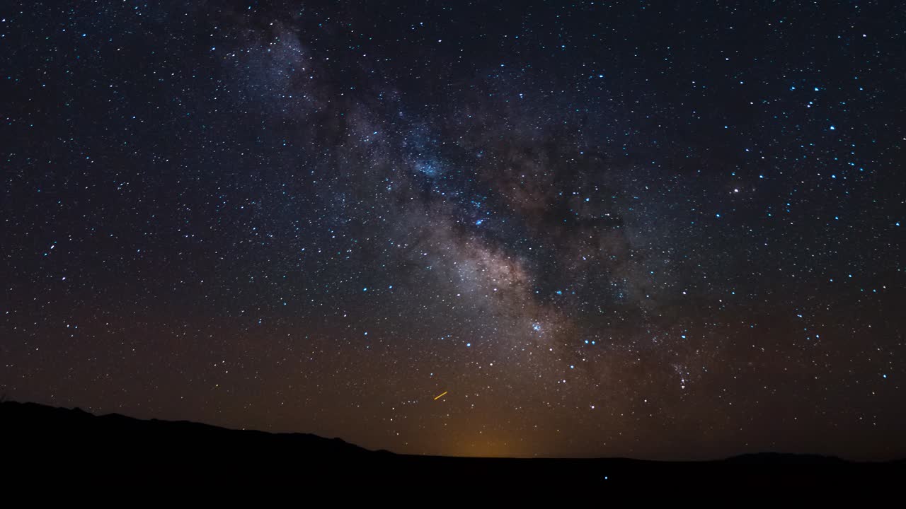 The galactic center of the Milky Way crosses the night sky over Utah's West Desert - sliding time lapse