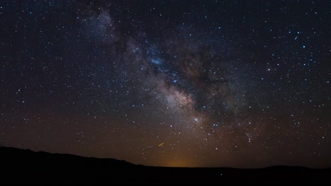 the galactic center of the milky way crosses the night sky over utah's west desert - sliding time lapse