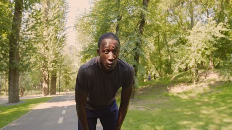 tired runner resting in park