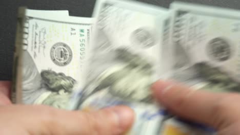 hands recount american dollars, 100 us dollars counting. concept use of money currency, financial markets
