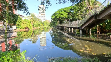 sunlight changes over urban river landscape