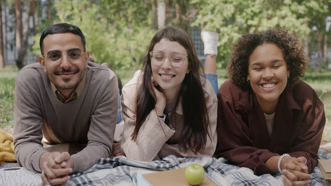 Happy Students Relaxing Together