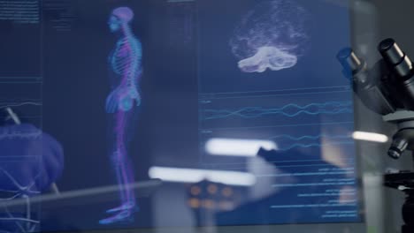 scientist reflecting in screens. detailed skeleton models on computer screen. looking for injury. futuristic laboratory research