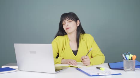 Woman-looking-at-laptop-is-happy-and-dancing.