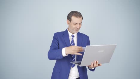 Businessman-shopping-on-the-phone-with-a-credit-card.