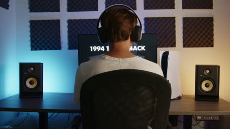 boy laying down his ps controller and headset