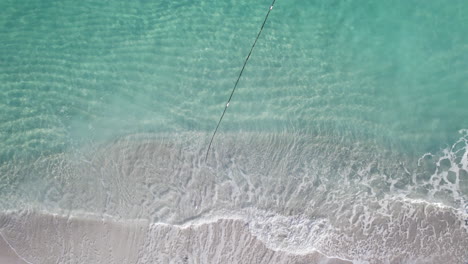 a desolate shoreline on a private caribbean island