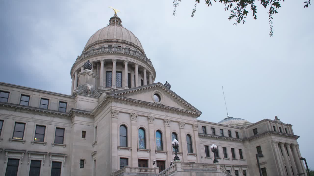 Wide: Stormy skies over the Mississippi State Capitol building. Jackson, MS
