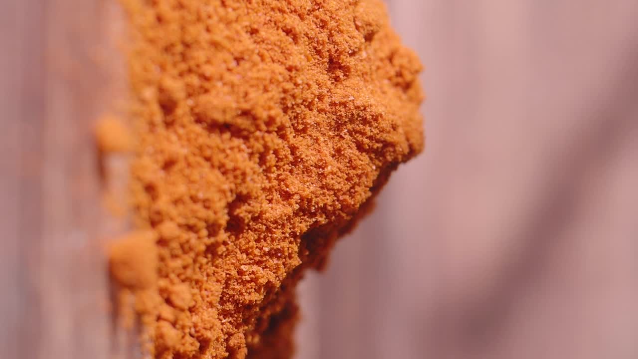 Close-up of orange spice powder