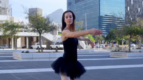 ballet dancer performing on the pavement 4k