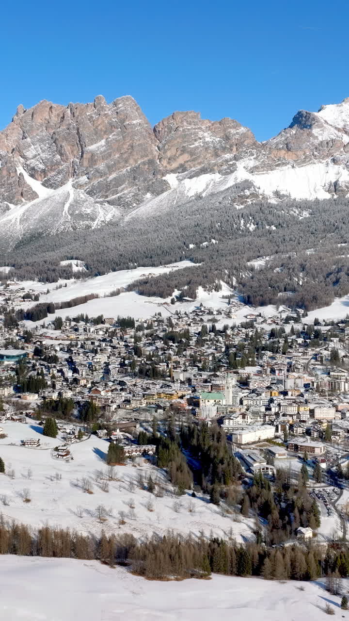 Aerial drone view of the Cortina d'Ampezzo town in the Dolomites, Italy. Vertical