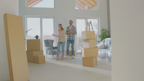 exciting couple in their new apartment