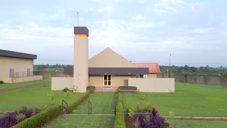 an african church with simple design and lawn
