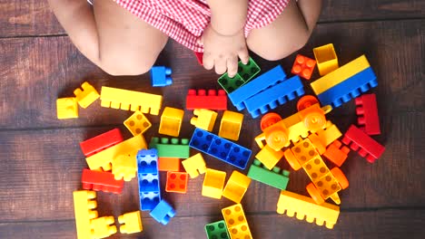 child playing with building blocks