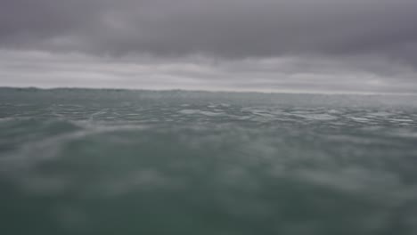 ocean waves with stormy ominous sky