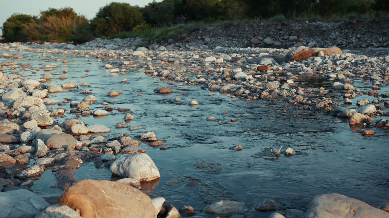 River Flows Through Rocks In Calabria Giving A Sense Of Religious Relaxation