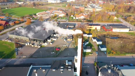 aerial view of industrial chimney smoke