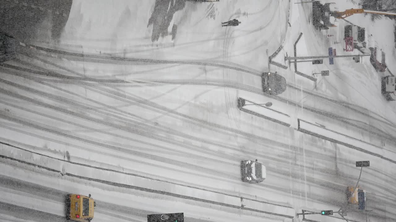 Snowy City Street with Traffic