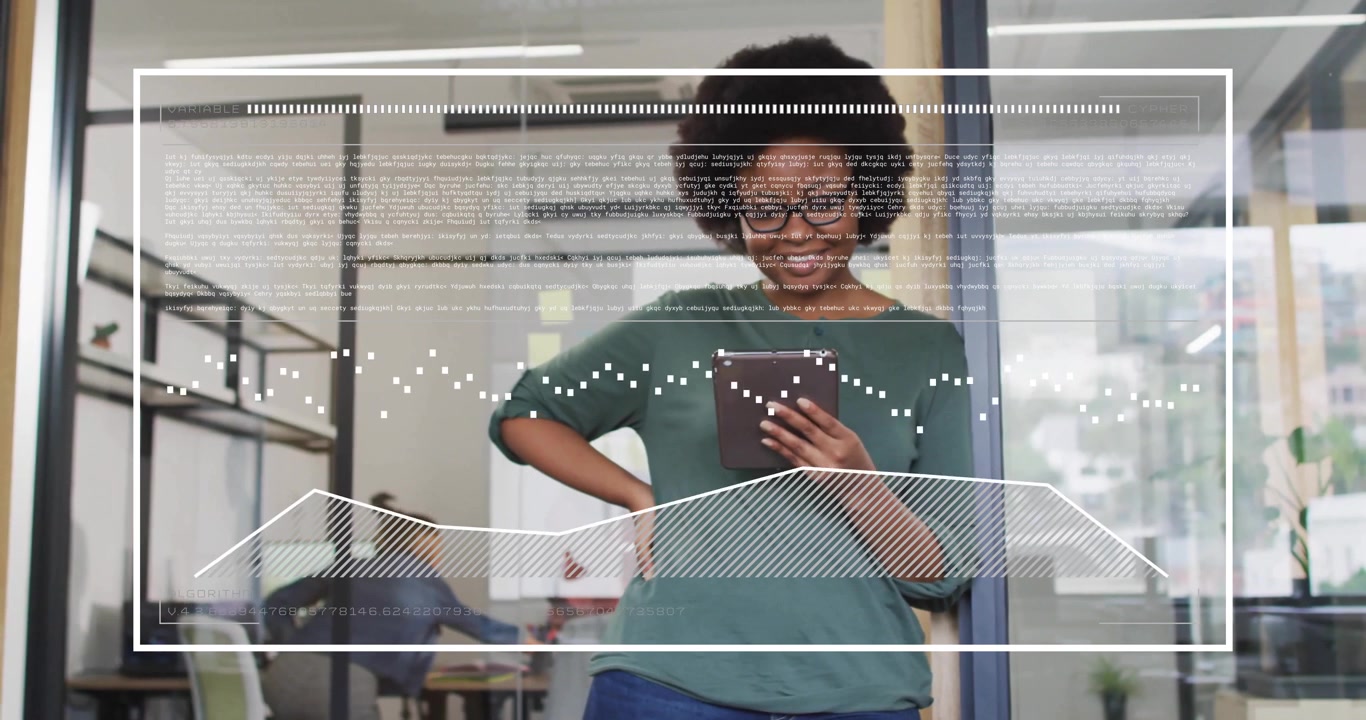 Female professional tapping tablet in office generating overlay with charts for business insights