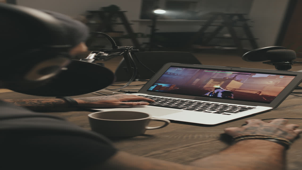 Vertical Shot of Man Live-Streaming Video Game