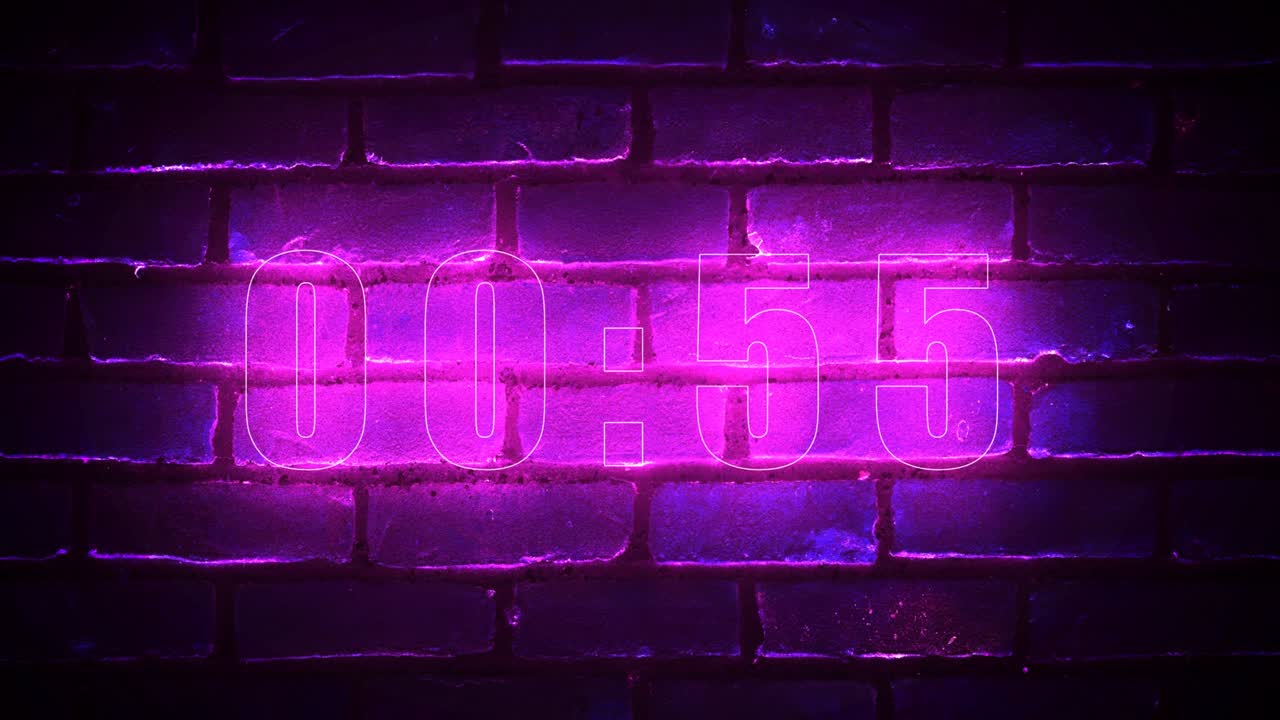 Colorful neon one minute timer with brick wall on background.