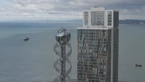 cinematic daytime drone footage of batumi skyline and skyscrapers.