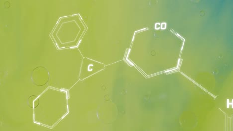 animation of chemical formula over bubbles on green background