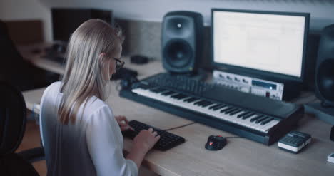 Woman-Working-In-Studio-Office