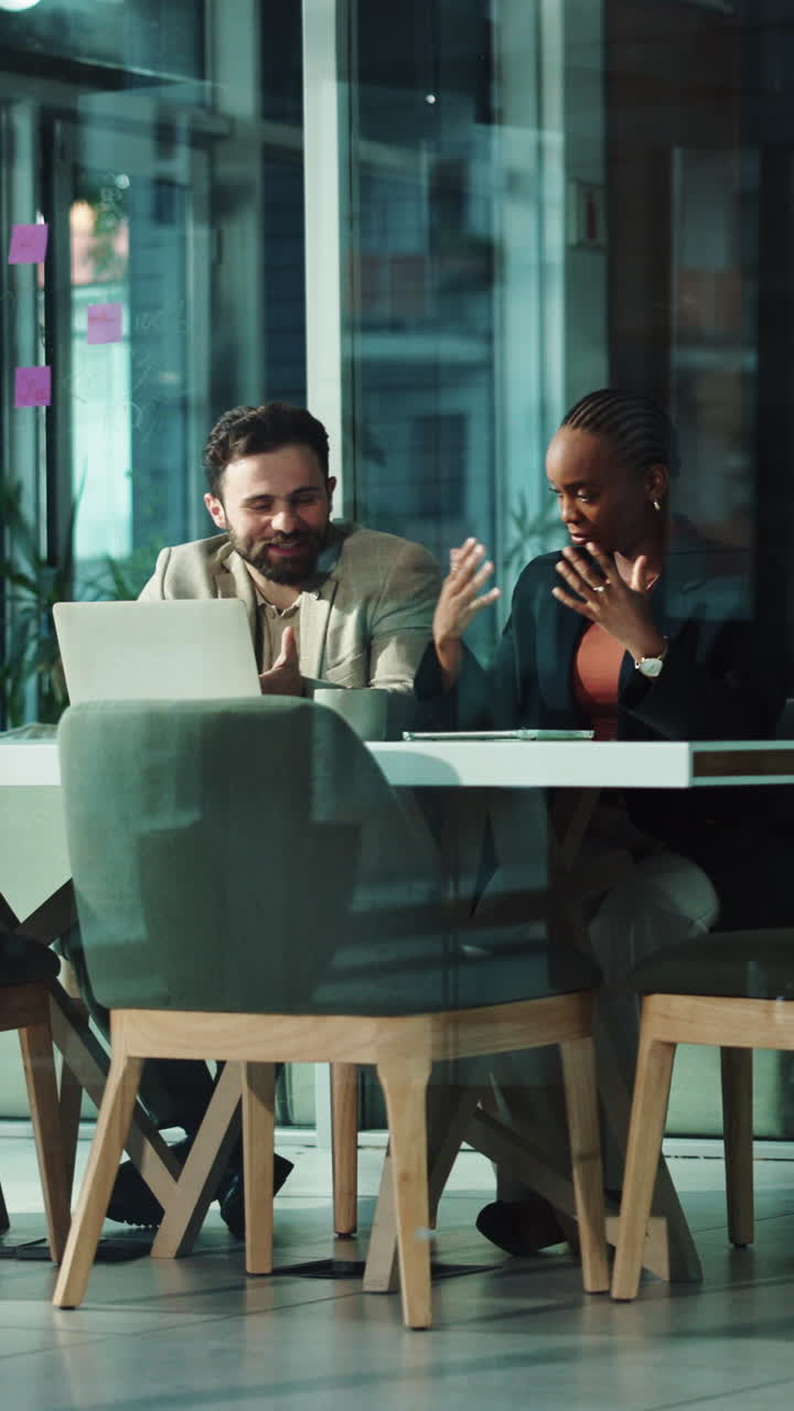 Diverse Business Colleagues Discussing Project in Modern Office