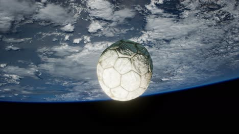 old soccer ball in space on earth orbit