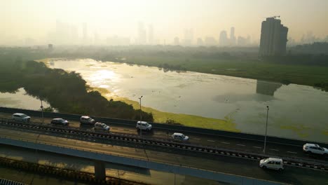 Aerial-shot-of-the-skyline-of-a-residential-area-in-the-city-of-Mumbai,-India-during-the-day-with-extreme-levels-of-air-pollution