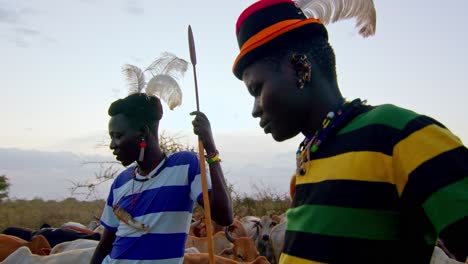 Karamojong Warriors Engaged in Conversation in Uganda, Africa - Close Up